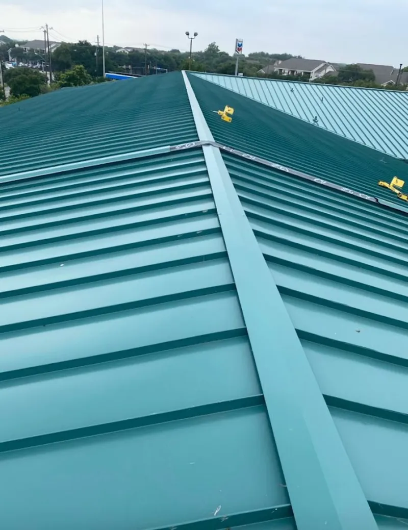 Green commercial metal roof ridge and valley for Metal Roof Repair in Krum