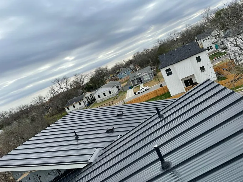 Standing seam metal roof panels with vents for Skylight Repair in Krum